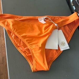 Orange Tory Burch bathing suit bottoms